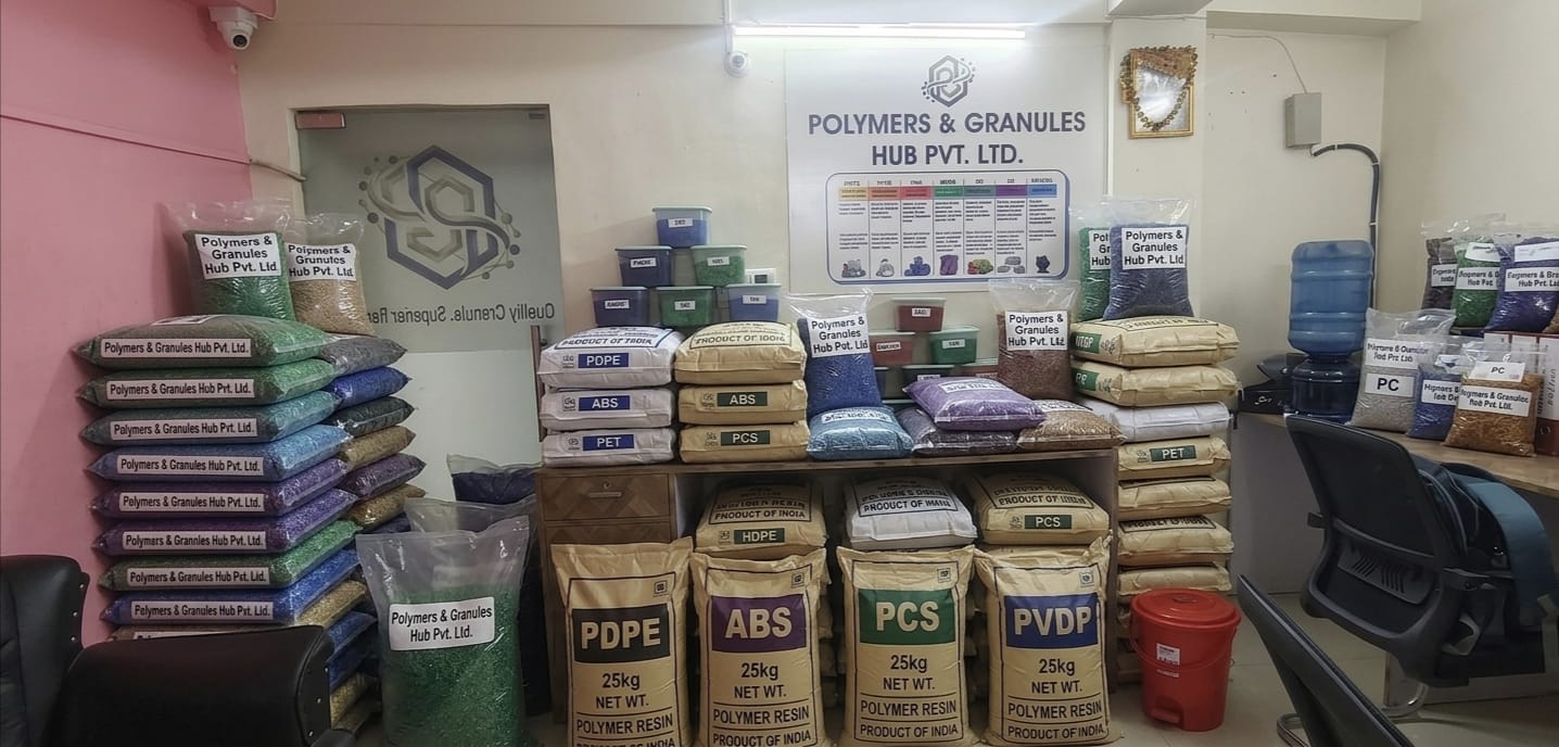 Polymers and Granules Hub office workspace and stacked material sacks